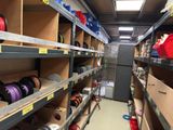 many different types of wires on the shelves in the store