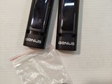 two black batteries that are sitting on a table