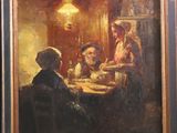 une peinture à l'huile représentant un groupe de personnes assises autour d'une table