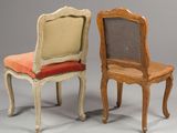 pair of antique chairs with upholstered back and seat cushions
