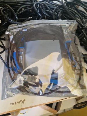 a bag of wires and cords sitting on a table