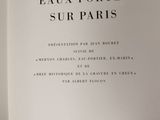 an open book with a black and white image of the title of the book
