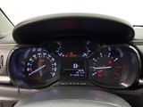a close up of a car dashboard with a speedometer and gauges
