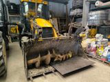 a bulldozer that is sitting in a garage