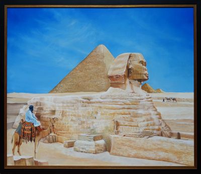 un tableau représentant un homme à dos de chameau devant une pyramide
