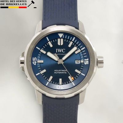 a watch with a blue dial on a blue strap
