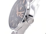 a close up of a wrist watch with a black dial