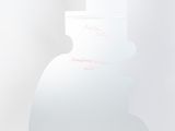a white vase that has a pink writing on it