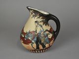 a small pitcher with a painting on it on a table