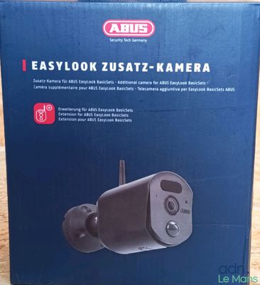 a close up of a box of a camera on a table