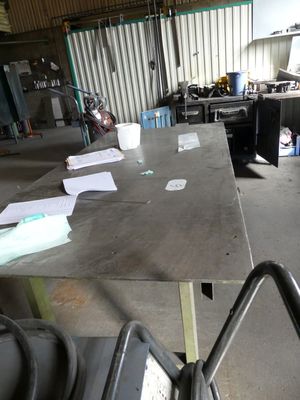 a table that has a lot of papers on it