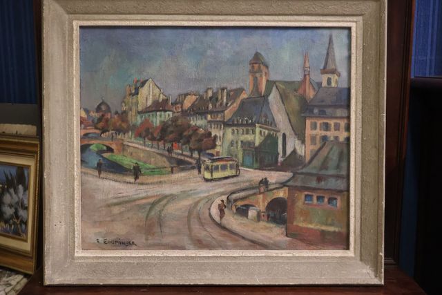 E. ENSMINGER « Vue de ville ». Huile sur toile. Signé en bas à ga...