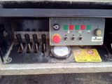 an image of a machine that is sitting in the back of a truck