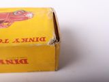 a yellow box with a picture of a red car on it