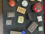 a table with a lot of different types of magnets on it