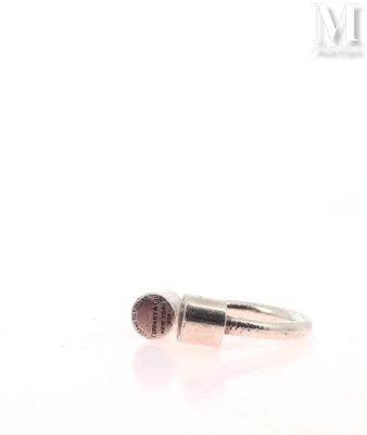 an image of a silver ring with a pink stone in it