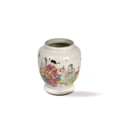 a white vase with a painting on it on a white surface