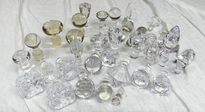 a lot of glass objects that are on a table