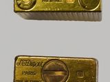 three different types of gold bars are shown on a white surface