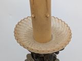 a candle that is sitting on top of a table