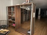 an image of a room with a closet and a chair
