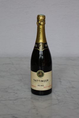 a bottle of wine that is sitting on a table