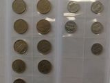 a picture of a display case with coins in it
