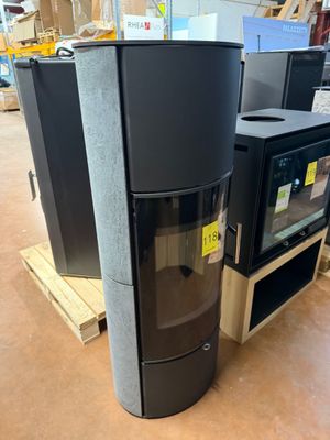 two stoves and a microwave in a store