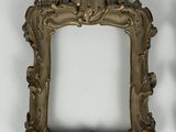 pair of antique brass picture frames on a white background