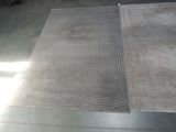 two rugs that are on the floor in the room