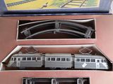 a box with a train set inside of it