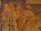 painting of a group of people standing in front of a cross on a wall