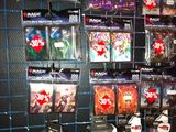 a wall of video games on display in a store