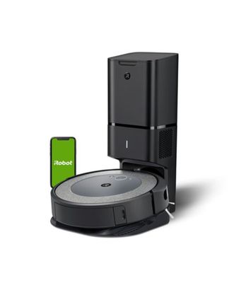 l'aspirateur robot est connecté à un téléphone posé sur un support