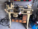 a machine that is sitting on a table in a garage