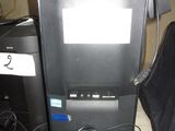 a computer monitor sitting on top of a pile of wires