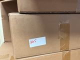 many boxes stacked on top of each other on the floor
