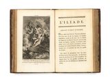 un livre ouvert avec la photo d'un homme et d'une femme