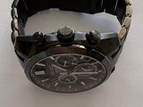 a watch that is on display on a table