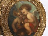 painting of two cherenshes in a gold frame with a white background