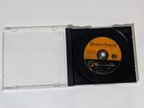 a cd in a clear case sitting on a table