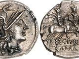 un gros plan d'une pièce d'argent représentant un homme à cheval