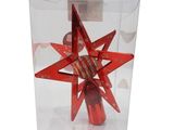 a red star ornament inside of a clear box