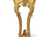 a gold console table with a marble top on a white background