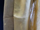 an image of a close up of a piece of cloth with a letter on it