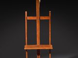 an image of a wooden easer with a cross on top of it