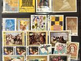 many different stamps on the wall in this picture