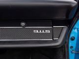 an image of a close up of a car door with the door handle open