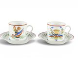 deux tasses et soucoupes ornées d'un motif représentant un homme et une femme