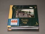 a book with a picture on it sitting on a table
